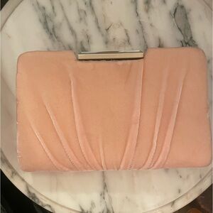 Pink velvet clutch